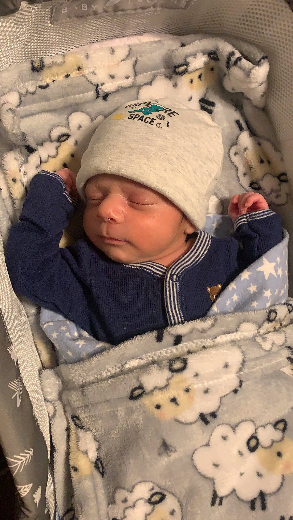 Apollo Galvan joined the competition — help win amazing prizes! baby, baby_sleeping, baby_toddler_clothing, beanie, cap, cheek, child, comfort, freezing, happy, headgear, headwear, human_body, knit_cap, linens, outerwear, pattern, person, sleeve, textile