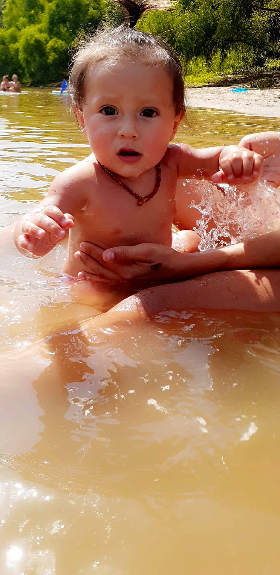 Derrick is registered to the contest to win money with this photo: bathing, child, fun, leisure, person, play, skin, smile, summer, toddler, vacation, water