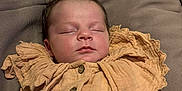 Maëlya a rejoint le concours — aidez-le/la à gagner de superbes lots ! baby, child, clothing, comfort, cozy, cushion, face, head, human, indoors, infant, newborn, peaceful, pillow, portrait, relaxation, ruffles, skin, sleeping, soft