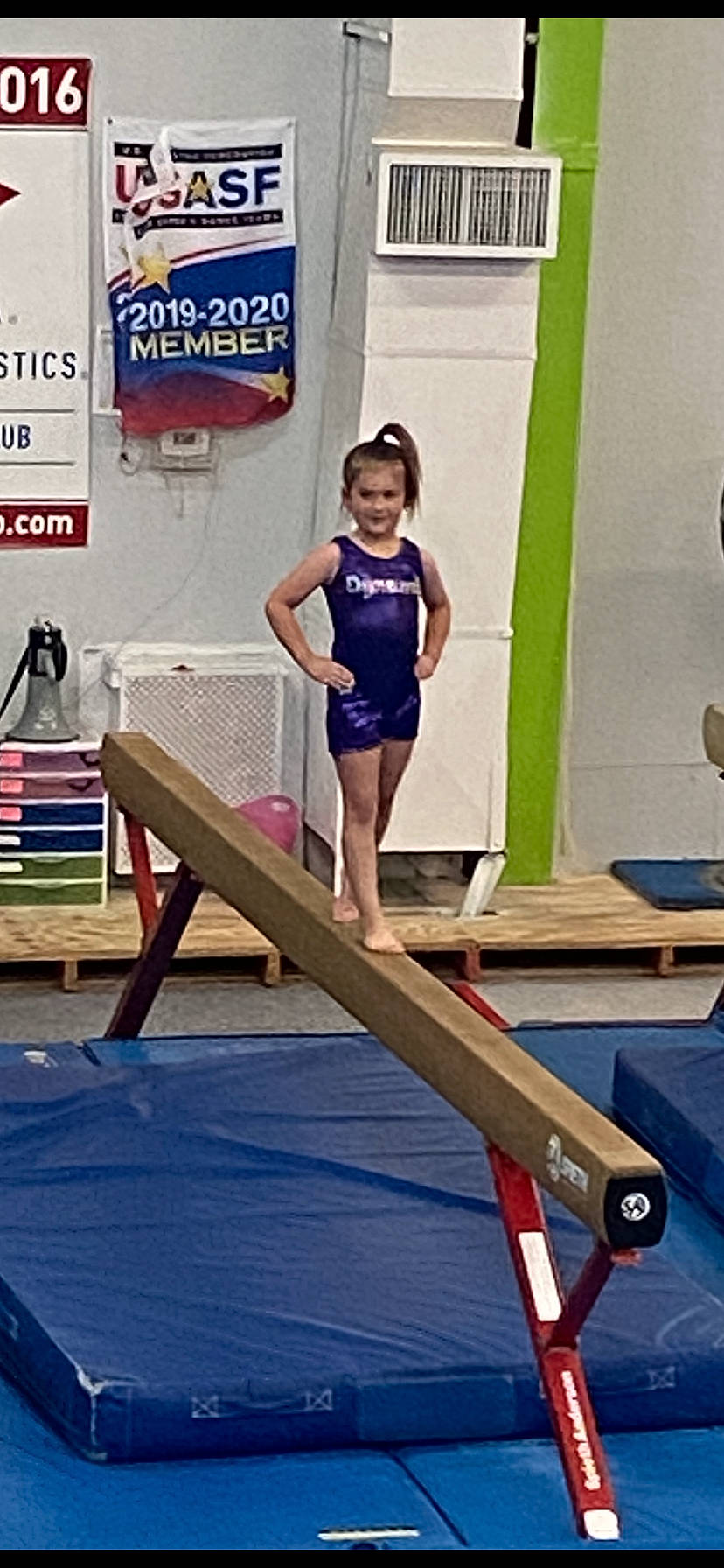Preslie joined the competition — help win amazing prizes! artistic_gymnastics, balance, balance_beam, barefoot, competition, competition_event, electric_blue, fun, gymnastics, joy, knee, leisure, logo, musical_instrument, person, recreation, shorts, smile, sports, sportswear
