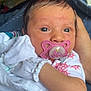 Xiomarrah is registered to the contest to win money with this photo: baby, newborn, pacifier, blanket, mitten, infant, closeup, person, sleepwear, resting, cute, pink, white, hand, face, eyes, soft, indoors, comfort, young