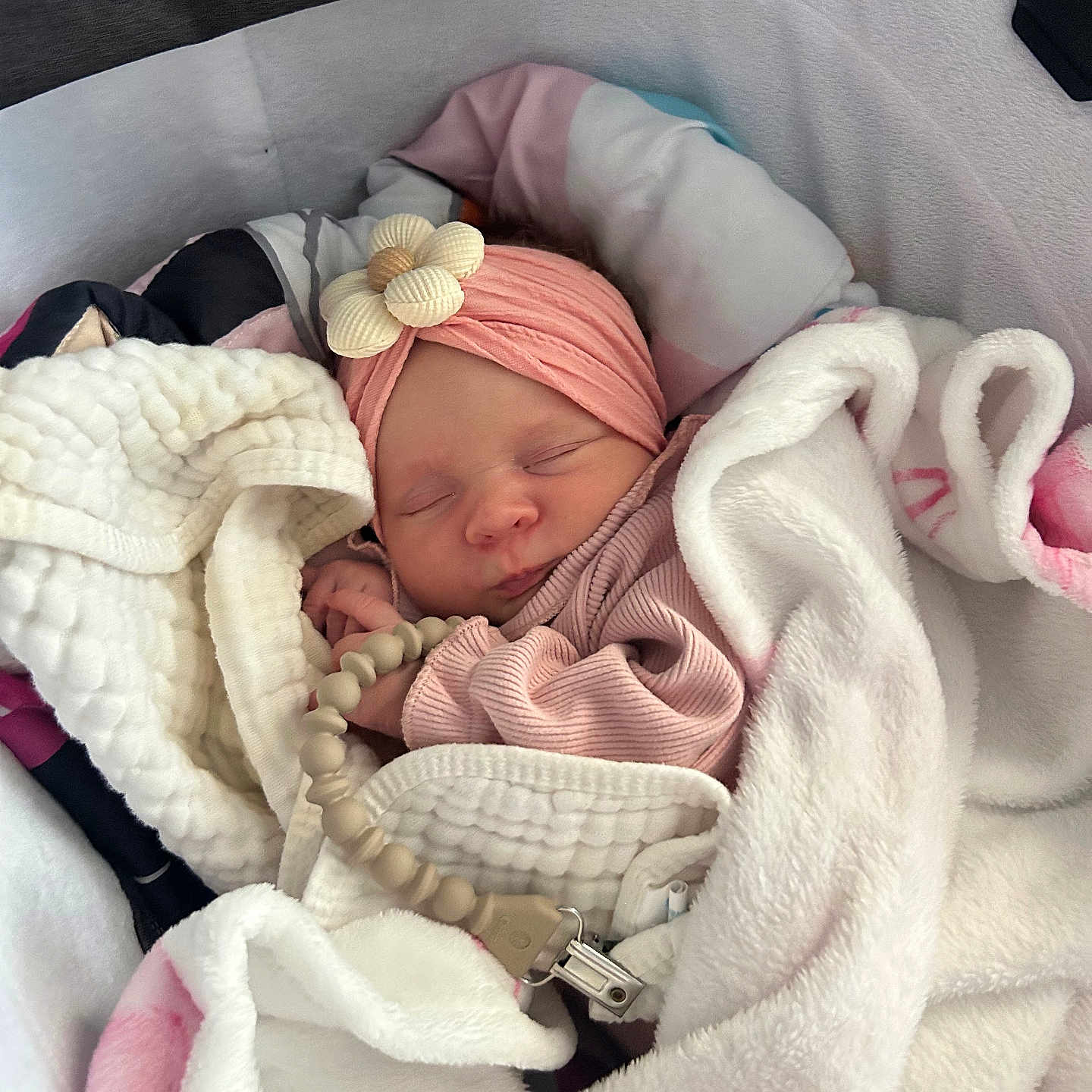 Luna joined the competition — help win amazing prizes! baby, newborn, sleeping, blanket, headband, flower, pink, soft, cozy, wrapped, infant, cute, peaceful, indoors, child, person, resting, warm, fabric, bed
