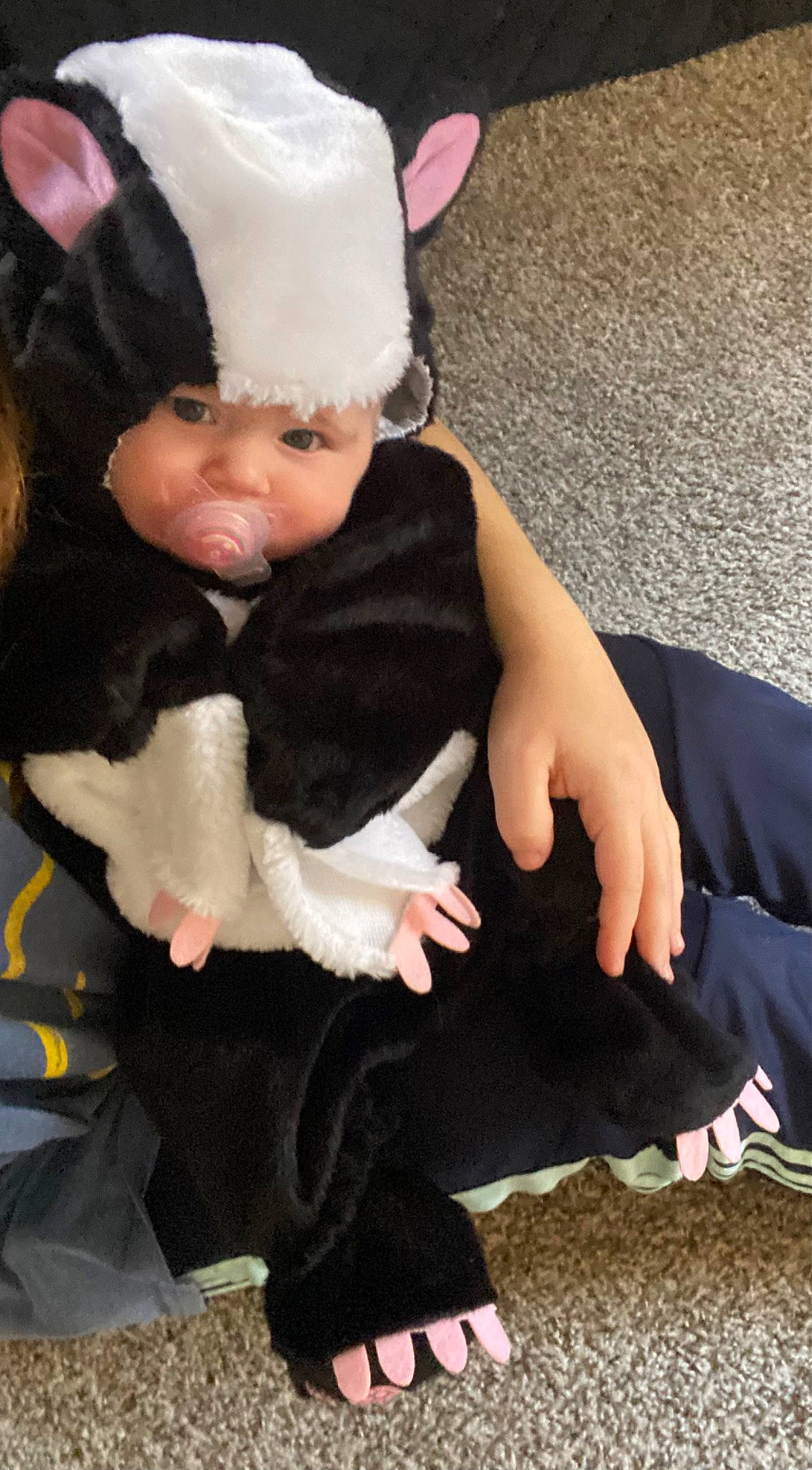 Alexandra joined the competition — help win amazing prizes! baby, baby_toddler_clothing, beanie, cap, child, costume, costume_accessory, costume_hat, doll, flooring, fun, fur, grass, headband, headwear, human_leg, person, sitting, sleeve, toddler