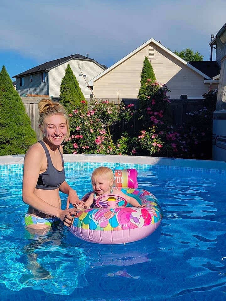 Adalee joined the competition — help win amazing prizes! aqua, baby_float, bathing, blue, building, cloud, face, fun, grass, house, joy, leisure, outdoor_recreation, person, plant, recreation, sky, smile, summer, swimming_pool