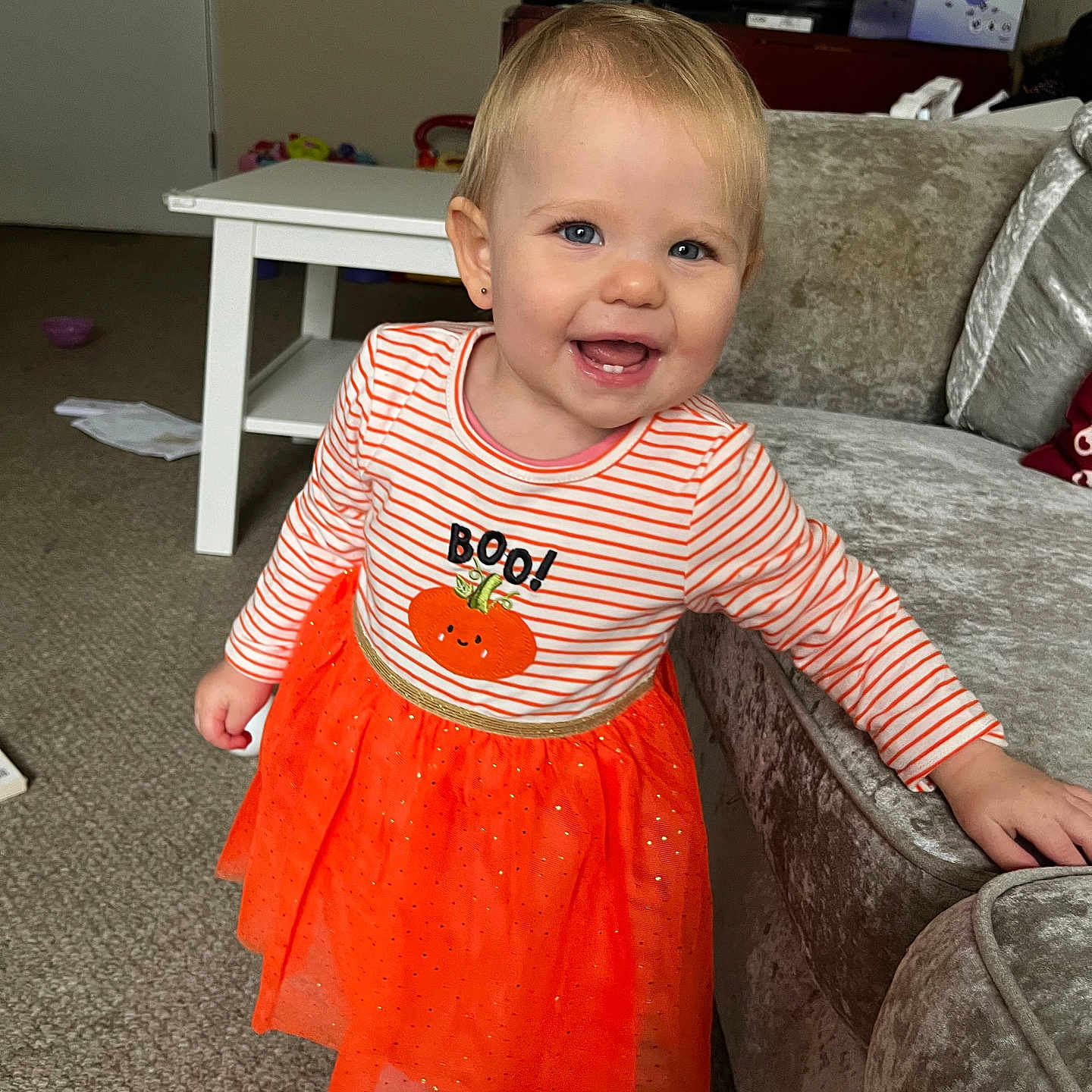 Arabella is registered to the contest to win money with this photo: architecture, baby, building, clothing, couch, cushion, dress, face, furniture, head, homedecor, indoors, interiordesign, livingroom, person, photography, portrait, room, sitting, skirt