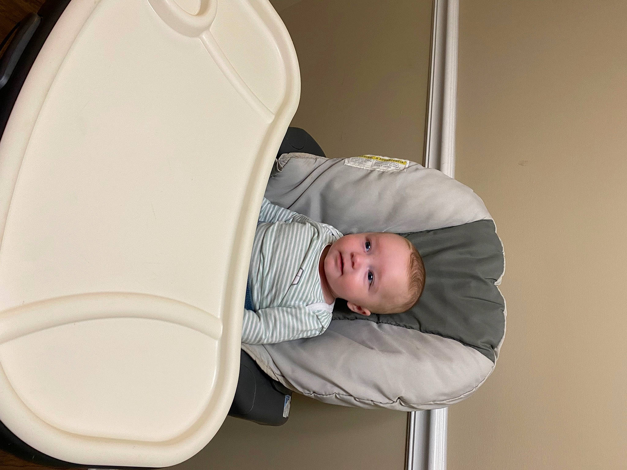 Noah is registered to the contest to win money with this photo: baby, baby_products, baby_safety, baby_sleeping, baby_toddler_clothing, child, cleanliness, comfort, infant_bed, person, room, service, sitting, toddler