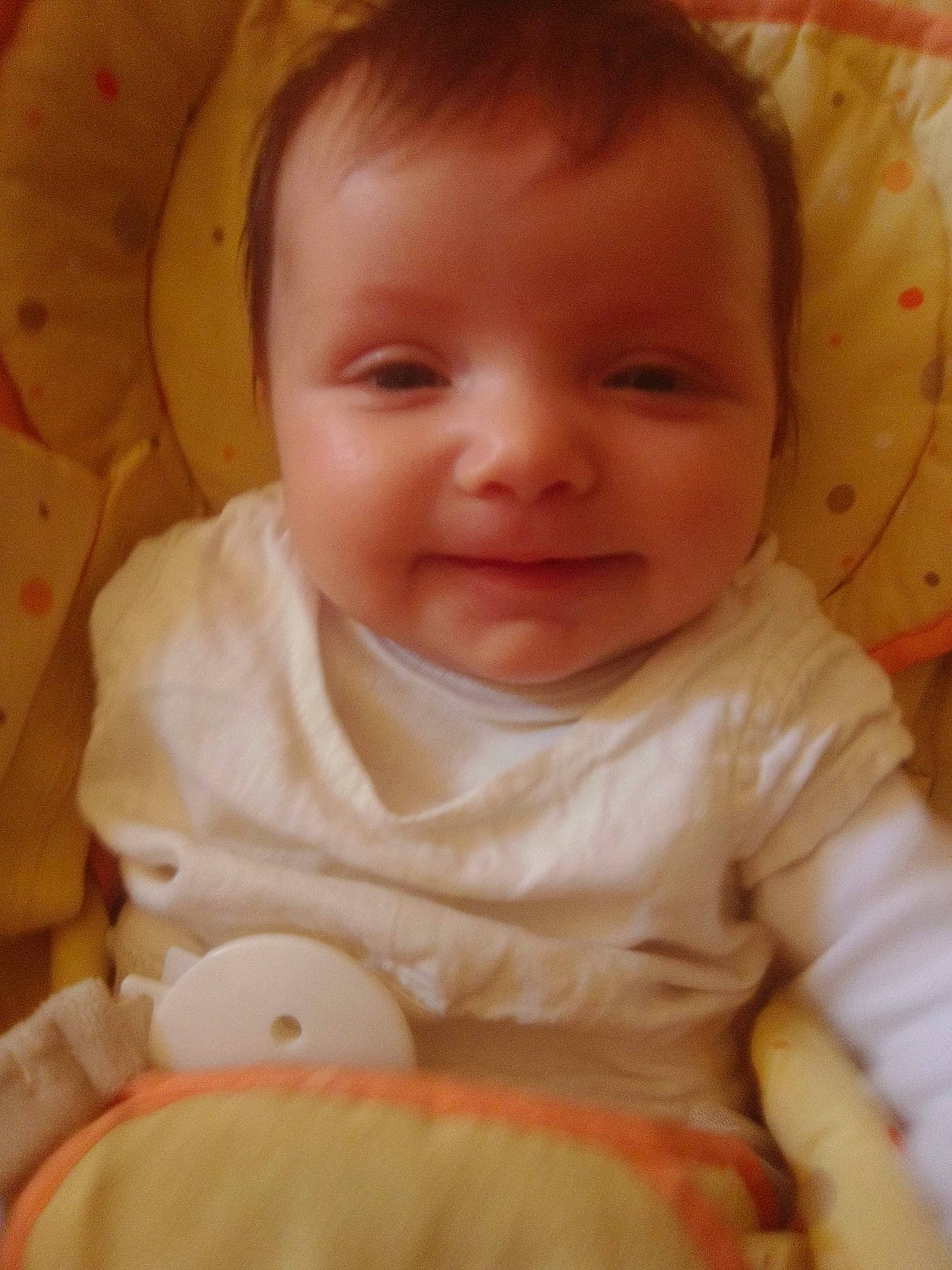 Irina participe au concours pour gagner de l'argent avec cette photo : baby, baby_toddler_clothing, cheek, chin, comfort, eye, fun, happy, human_body, iris, joy, lip, mouth, nose, orange, person, product, skin, sleeve, smile