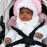 Khanyi joined the competition — help win amazing prizes! baby, baby_boy, baby_clothes, black_straps, child, comfort, cute, face, fur, hood, indoors, infant, pink_cushion, portrait, seatbelt, small_hands, soft_toys, stroller, warm_clothing, white_clothing