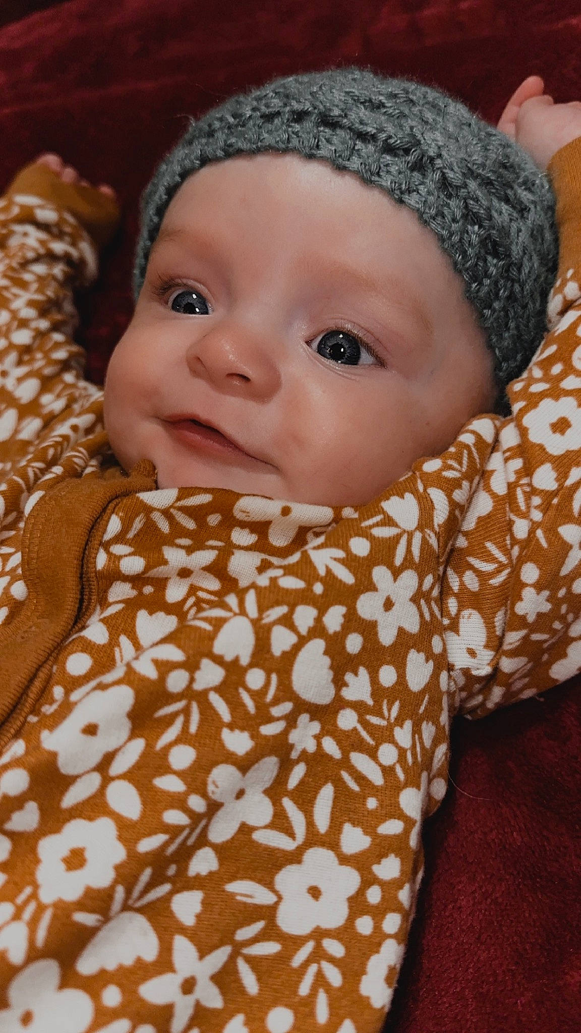 Octavia is registered to the contest to win money with this photo: baby, baby_toddler_clothing, beauty, cap, cheek, child, comfort, eye, head, headwear, linens, lip, nose, organ, outerwear, person, product, skin, sleeve, smile