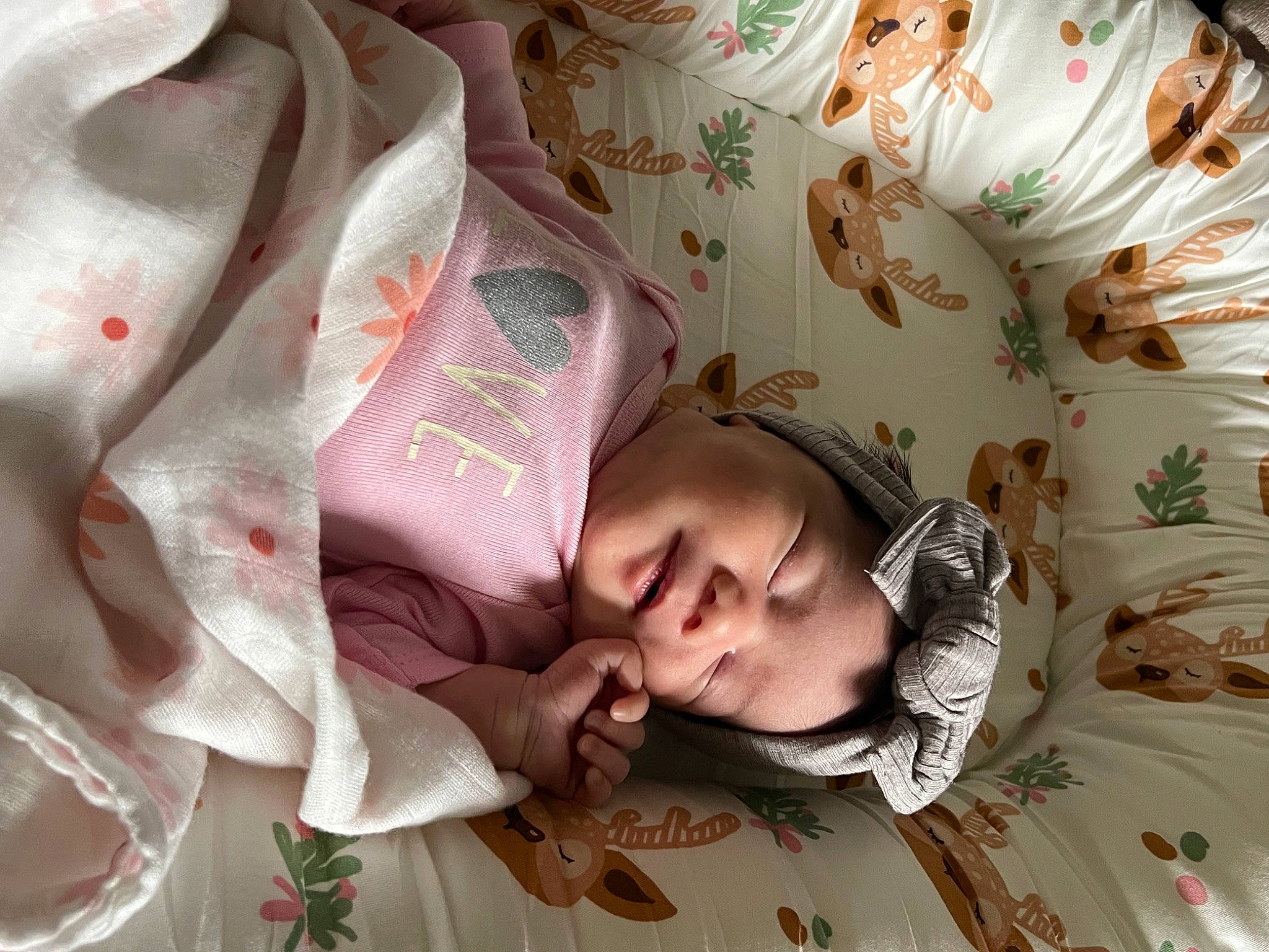 Athena joined the competition — help win amazing prizes! baby, bed_sheet, bedding, bedtime, cheek, child, comfort, event, happy, linens, pattern, person, petal, pink, porcelain, room, skin, smile, textile, toddler