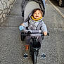 Sacha participe au concours pour gagner de l'argent avec cette photo : adult, baby, bicycle, car, city, clothing, face, head, machine, male, man, person, photography, portrait, road, street, transportation, urban, vehicle, wheel