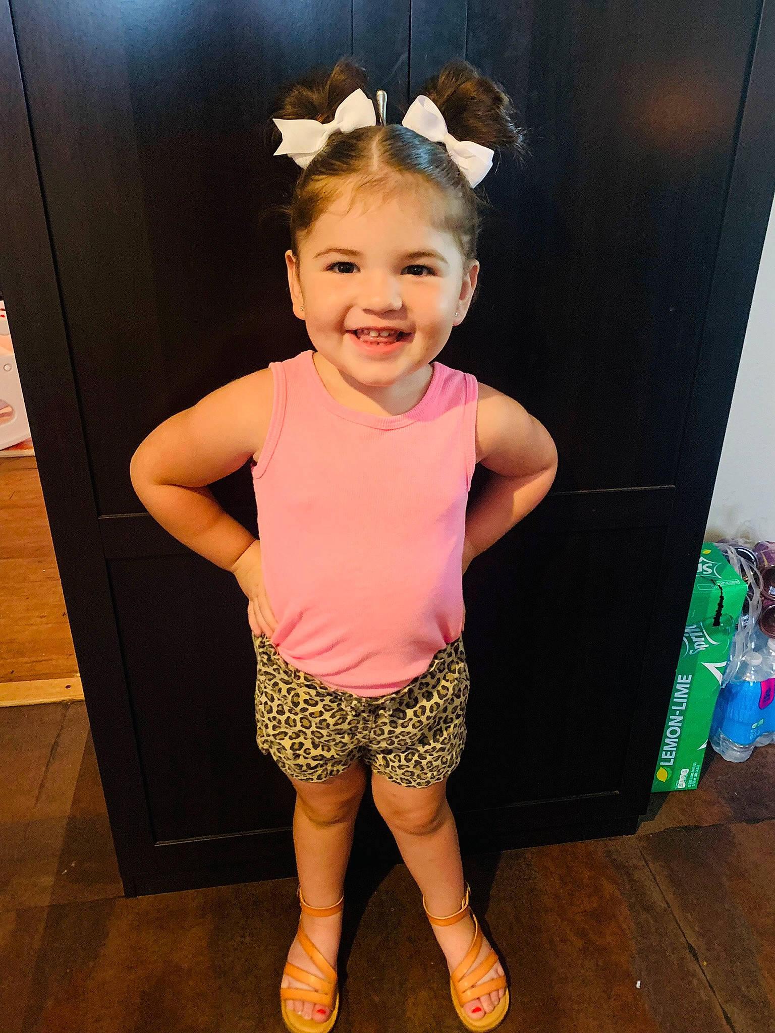 Acelynn is registered to the contest to win money with this photo: baby_toddler_clothing, child, flooring, fun, happy, human_leg, joy, magenta, neck, person, pink, purple, sandal, shoulder, skin, sleeve, smile, standing, thigh, toddler