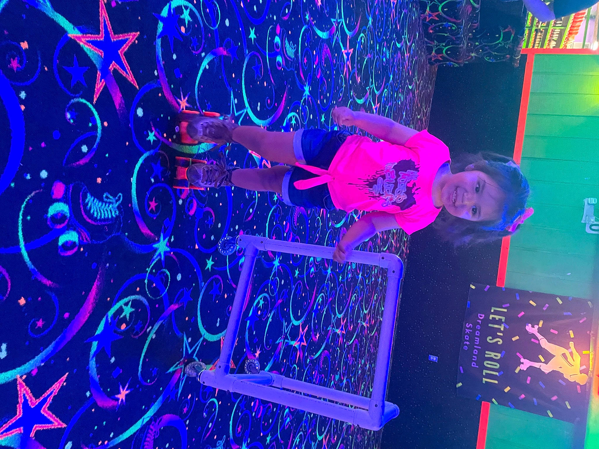 Yasmin is registered to the contest to win money with this photo: art, blue, electric_blue, electricity, entertainment, event, font, fun, graphics, joy, magenta, music, neon, organism, person, plant, purple, science, space, technology