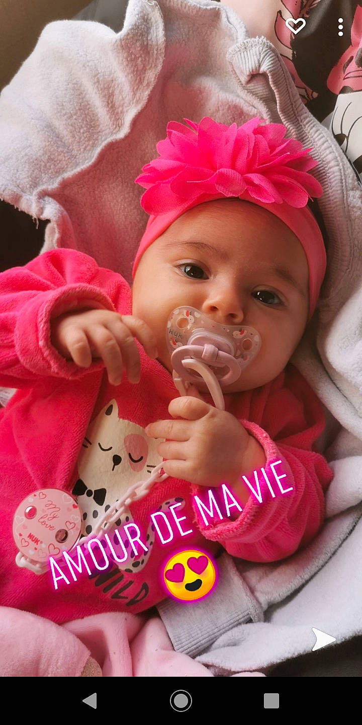 Loussyana participe au concours pour gagner de l'argent avec cette photo : baby, baby_products, baby_toddler_clothing, cap, cheek, child, event, eyelash, finger, happy, headband, headwear, lip, magenta, mouth, nail, person, pink, product, skin