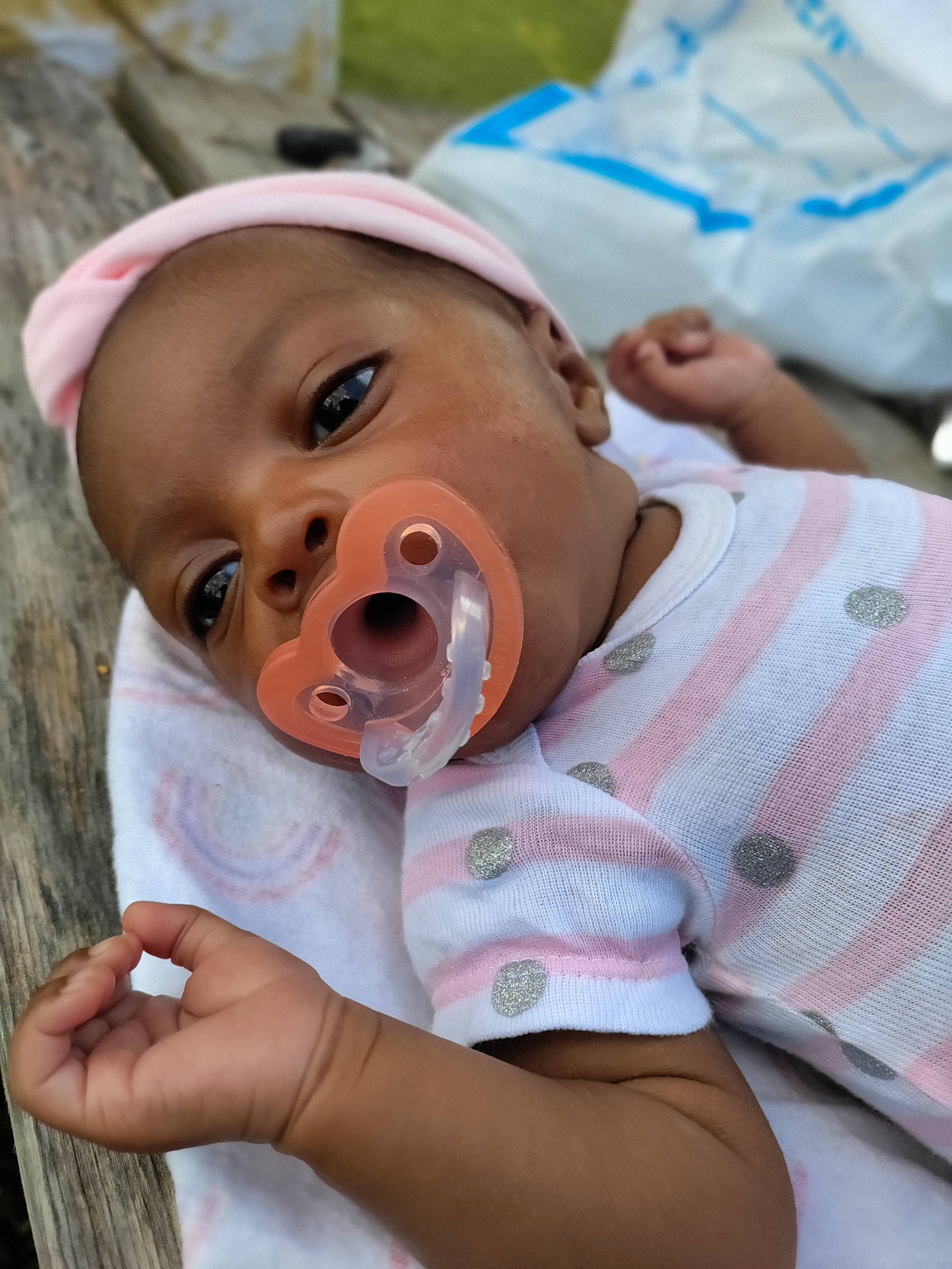 Echo is registered to the contest to win money with this photo: baby, baby_toddler_clothing, cheek, child, chin, event, face, fun, gesture, grass, happy, hat, head, iris, lip, mouth, nose, person, skin, toddler