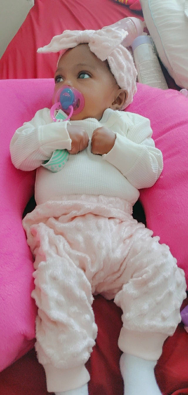 Echo joined the competition — help win amazing prizes! arm, baby, baby_toddler_clothing, cheek, chin, comfort, eye, face, finger, head, headwear, human_body, lip, mouth, nose, person, pink, skin, sleeve, textile