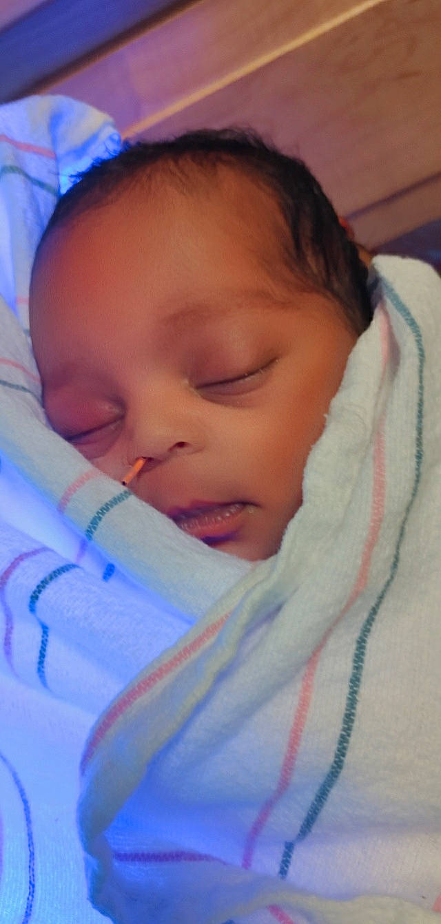 Echo is registered to the contest to win money with this photo: baby, cheek, child, chin, comfort, electric_blue, eyebrow, eyelash, fun, happy, iris, linens, lip, mouth, nose, person, pink, skin, smile, textile