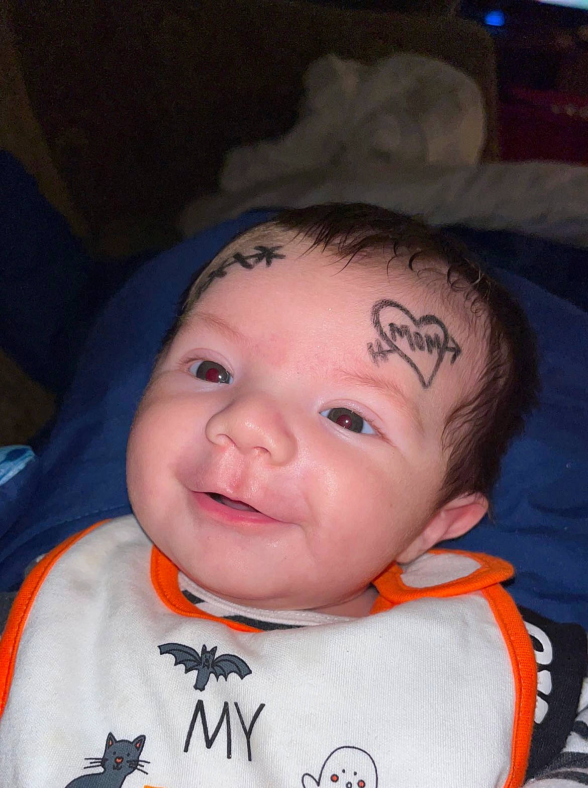 Parker is registered to the contest to win money with this photo: baby, baby_toddler_clothing, cheek, child, chin, collar, cool, eye, eyebrow, fun, happy, iris, lip, mouth, nose, person, skin, sleeve, smile, t_shirt