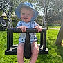 Finley joined the competition — help win amazing prizes! child, toddler, swing, playground, hat, smiling, sunlight, outdoor, grass, park, summer, happy, baby, feet, clothing, nature, trees, daytime, fun, play