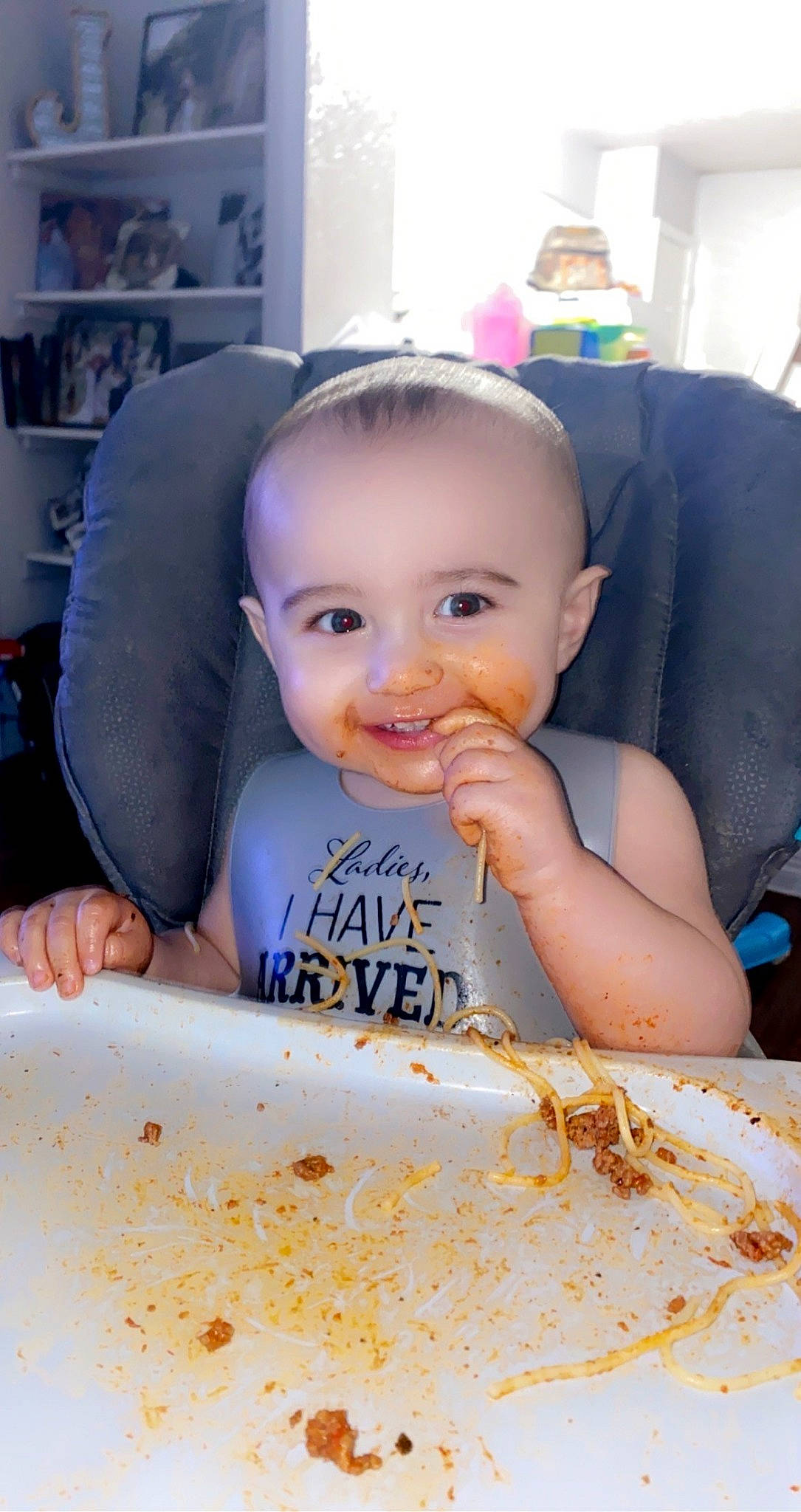 Dawson is registered to the contest to win money with this photo: baby, baby_food, cheek, child, chin, comfort_food, cuisine, dish, food, food_craving, fun, hairstyle, happy, head, ingredient, joy, mouth, person, shelf, skin