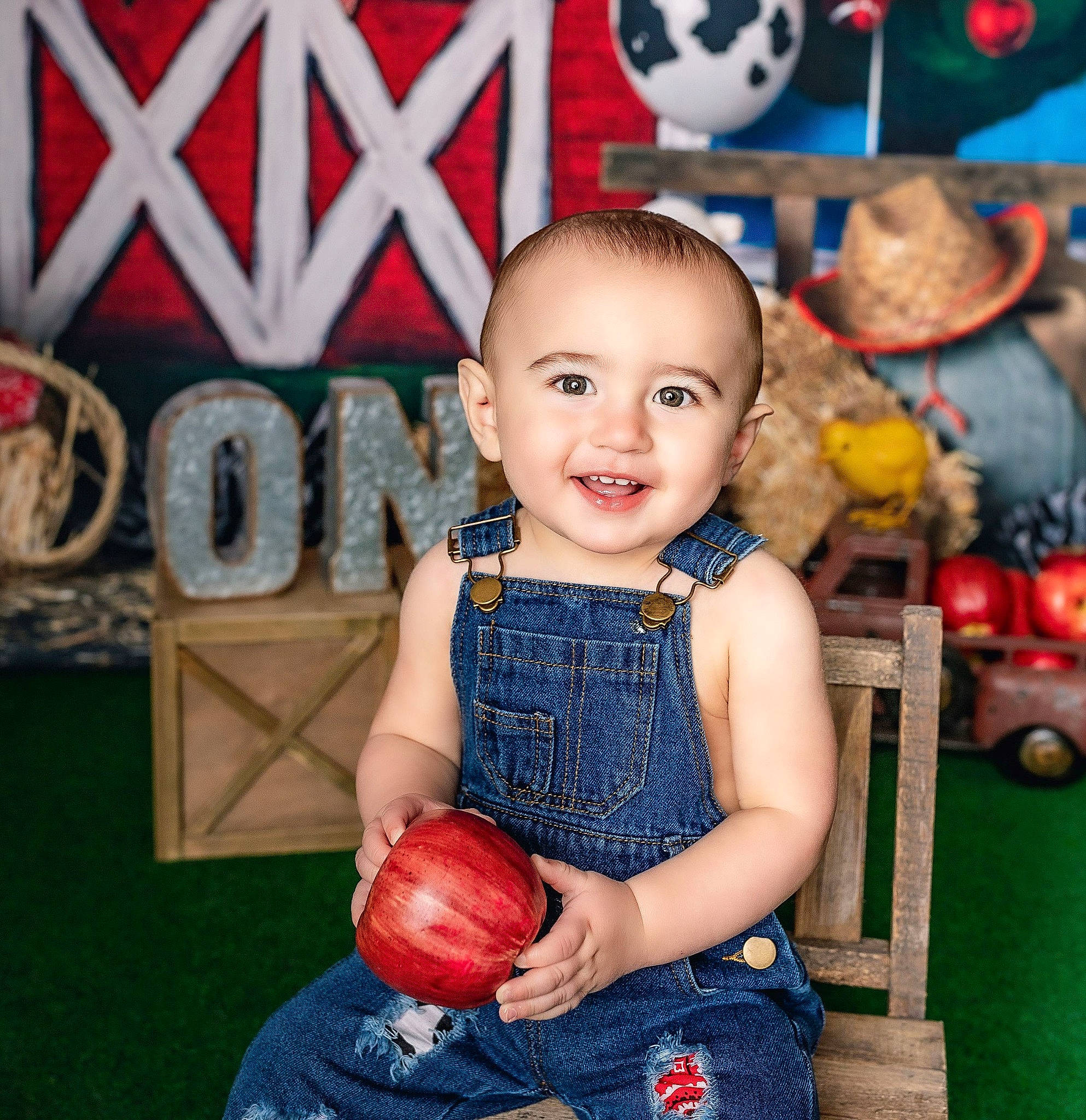 Dawson is registered to the contest to win money with this photo: baby, baby_toddler_clothing, blue, child, electric_blue, facial_expression, fun, happy, joy, leisure, magenta, pattern, person, red, sleeve, smile, snapshot, standing, t_shirt, tire