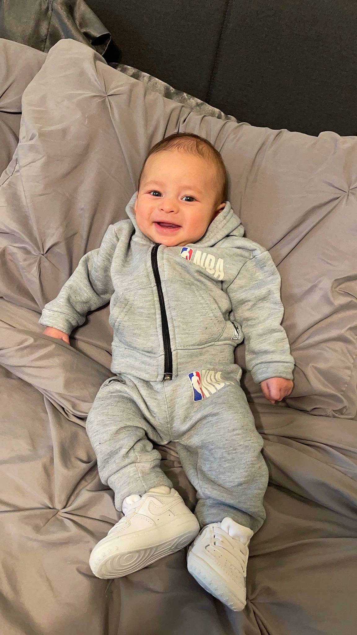 Eliyas joined the competition — help win amazing prizes! baby, baby_toddler_clothing, cargo_pants, cheek, child, comfort, face, fun, fur, gesture, happy, head, joy, outerwear, person, portrait_photography, sitting, skin, sleeve, smile