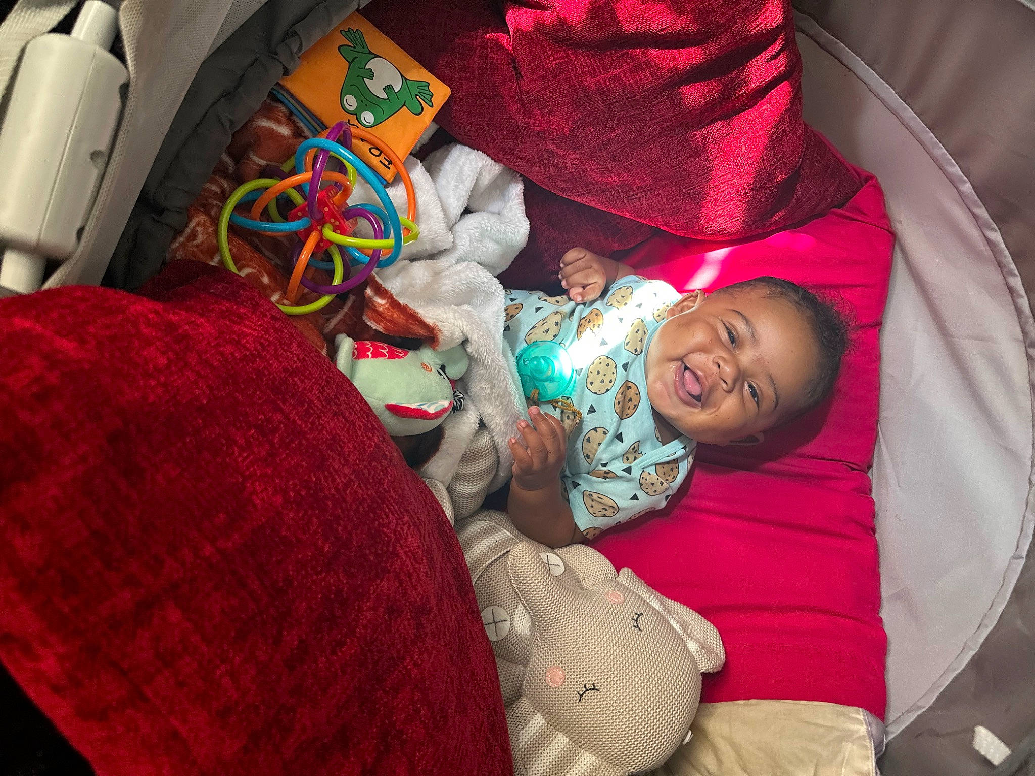 Brice joined the competition — help win amazing prizes! baby, car_seat, carmine, child, comfort, event, happy, headgear, linens, magenta, pattern, person, pink, red, room, smile, textile, toddler, wool, woolen