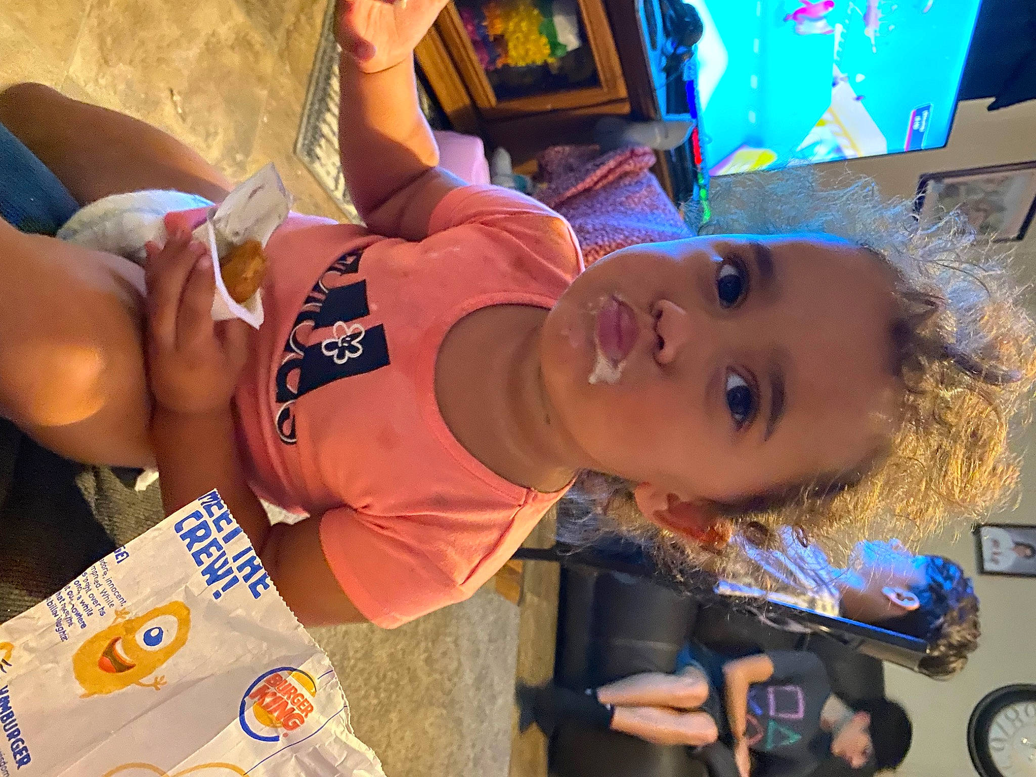 Ava is registered to the contest to win money with this photo: abdomen, brassiere, chest, child, cool, fast_food, fun, happy, hat, human_leg, leisure, mouth, person, play, recreation, summer, t_shirt, thigh, toddler, undergarment