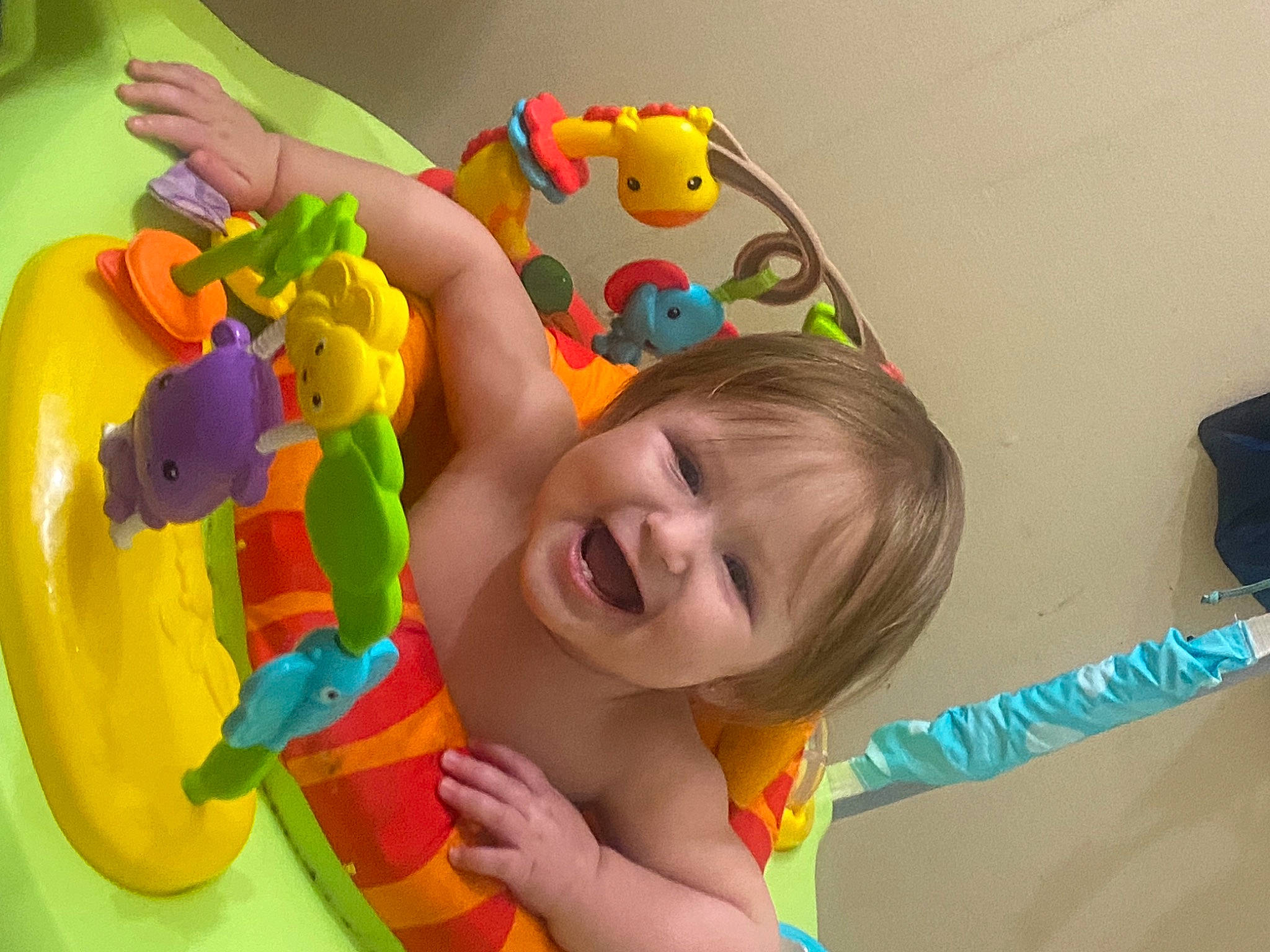 Peyton is registered to the contest to win money with this photo: baby, baby_playing_with_toys, baby_products, baby_toddler_clothing, baby_toys, child, facial_expression, fun, happy, joy, laugh, leisure, party, party_supply, person, plastic, play, recreation, room, smile