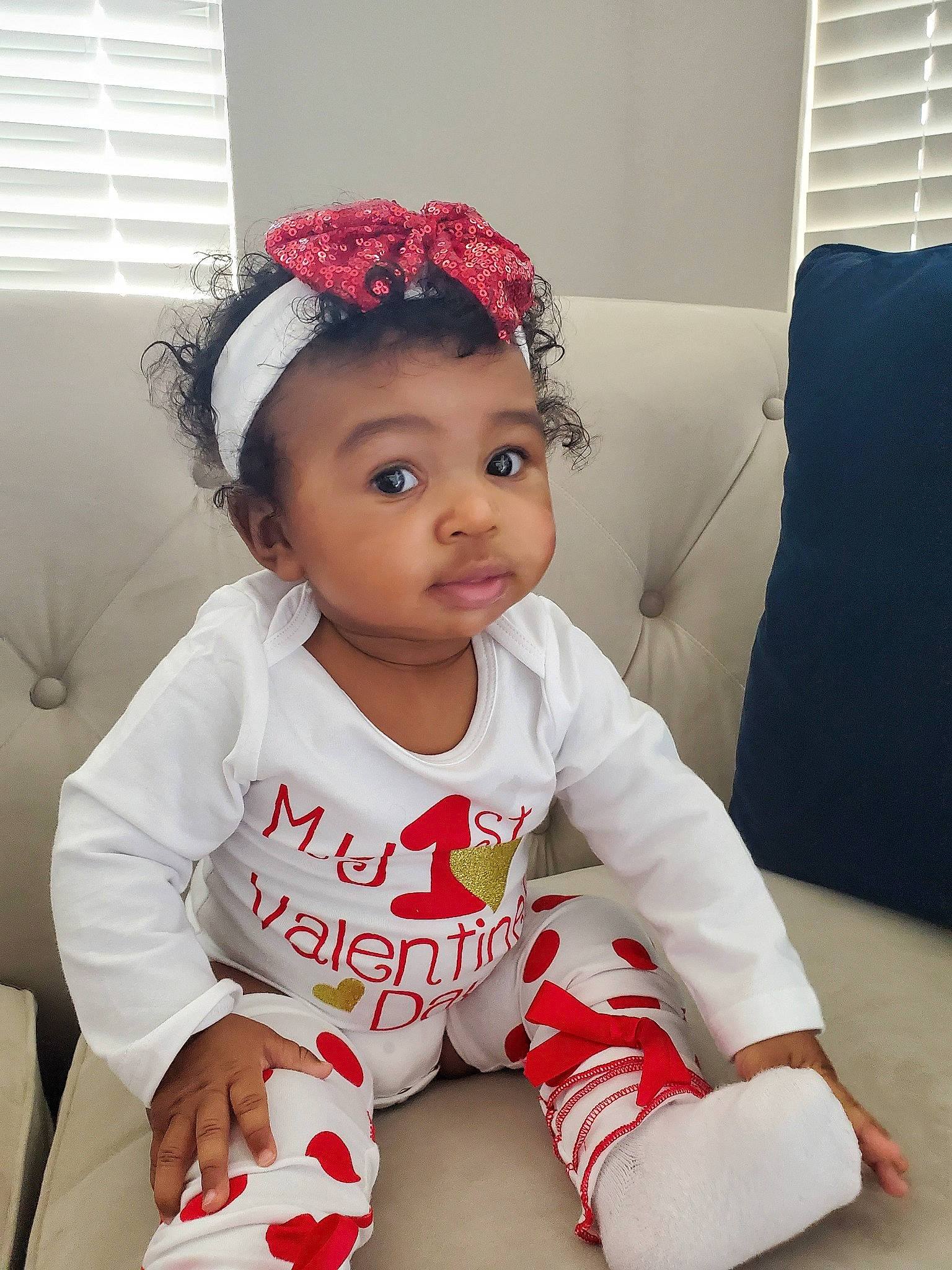 Monroe is registered to the contest to win money with this photo: baby, baby_toddler_clothing, child, fashion_accessory, hair_accessory, headband, headgear, headpiece, person, pink, sitting, toddler