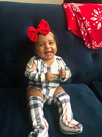 Monroe is registered to the contest to win money with this photo: baby, baby_toddler_clothing, child, child_model, fashion_accessory, footwear, headgear, leg, pattern, person, play, shoe, sleeve, smile, tights, toddler