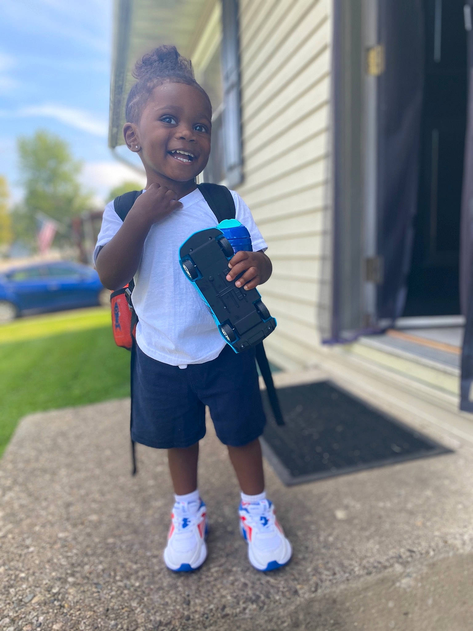 Kayden joined the competition — help win amazing prizes! baby_toddler_clothing, electric_blue, face, fun, grass, happy, hat, joy, knee, leisure, mammal, person, plant, public_space, shorts, sky, sleeve, smile, sportswear, thigh