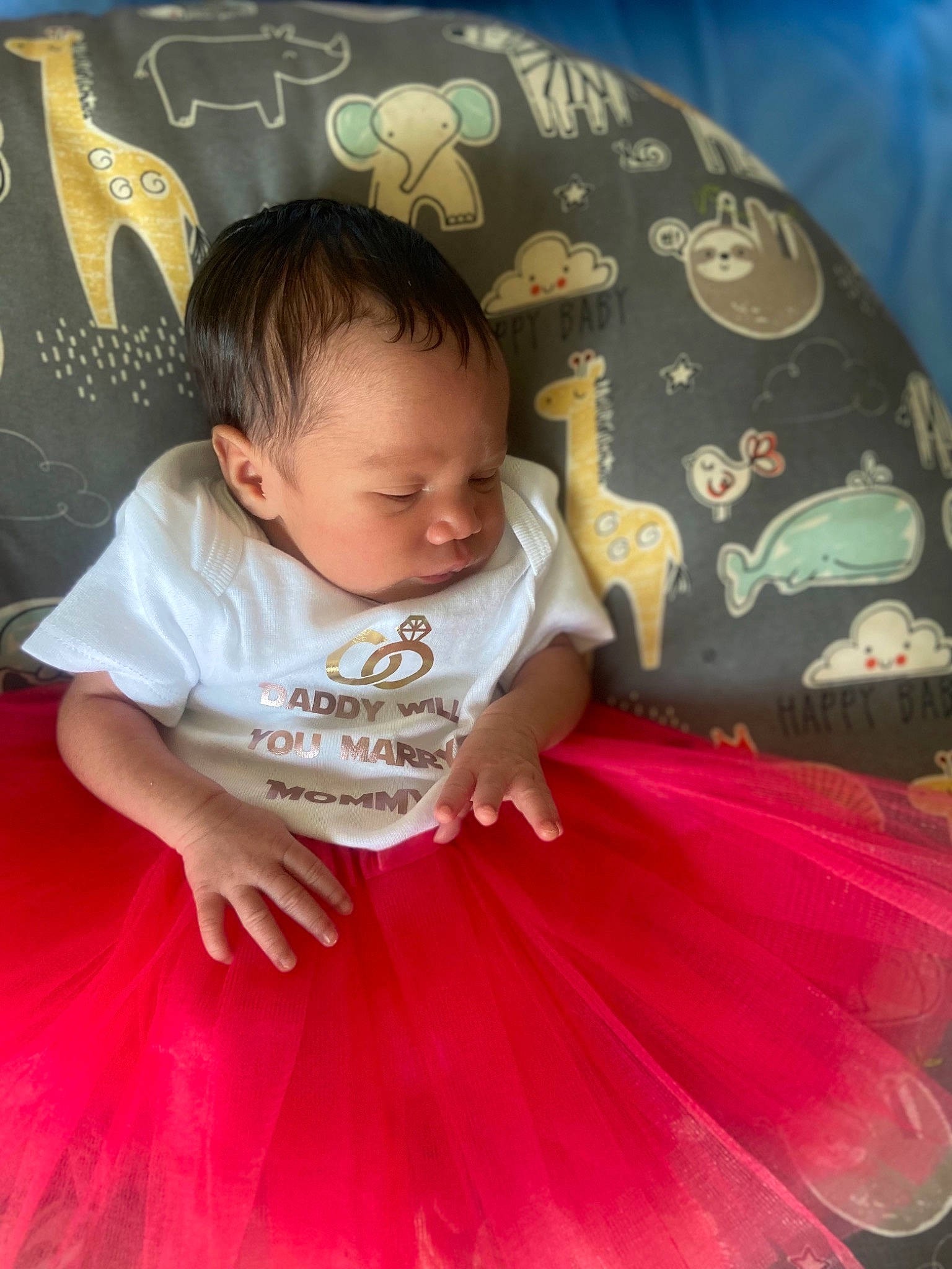 Jakayla is registered to the contest to win money with this photo: baby, baby_toddler_clothing, cheek, comfort, dress, eye, facial_expression, finger, flash_photography, hairstyle, happy, head, iris, orange, organ, person, pink, skin, sleeve, textile