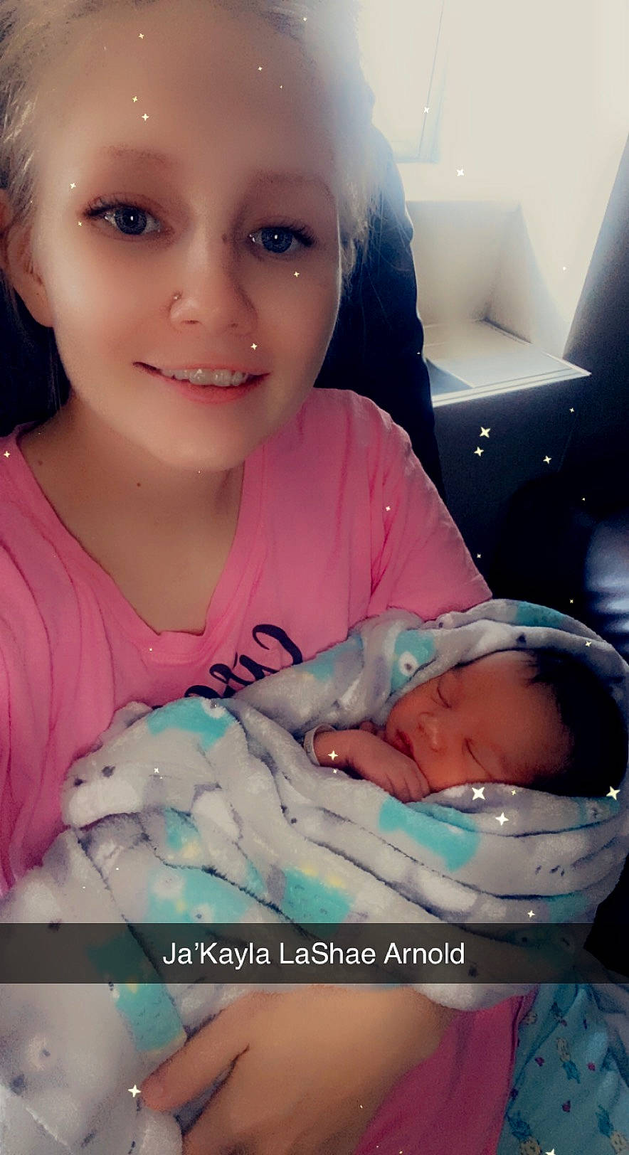 Jakayla is registered to the contest to win money with this photo: baby, baby_toddler_clothing, cheek, child, eyebrow, eyelash, finger, gesture, hand, happy, joy, lip, mouth, nail, organ, person, pink, skin, sleeve, smile