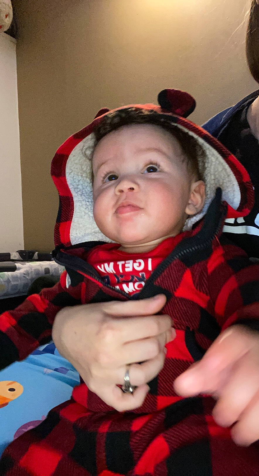 Kyrie joined the competition — help win amazing prizes! baby, baby_toddler_clothing, cheek, chin, eye, facial_expression, finger, gesture, hand, happy, iris, lip, mouth, nose, outerwear, person, red, skin, sleeve, tartan