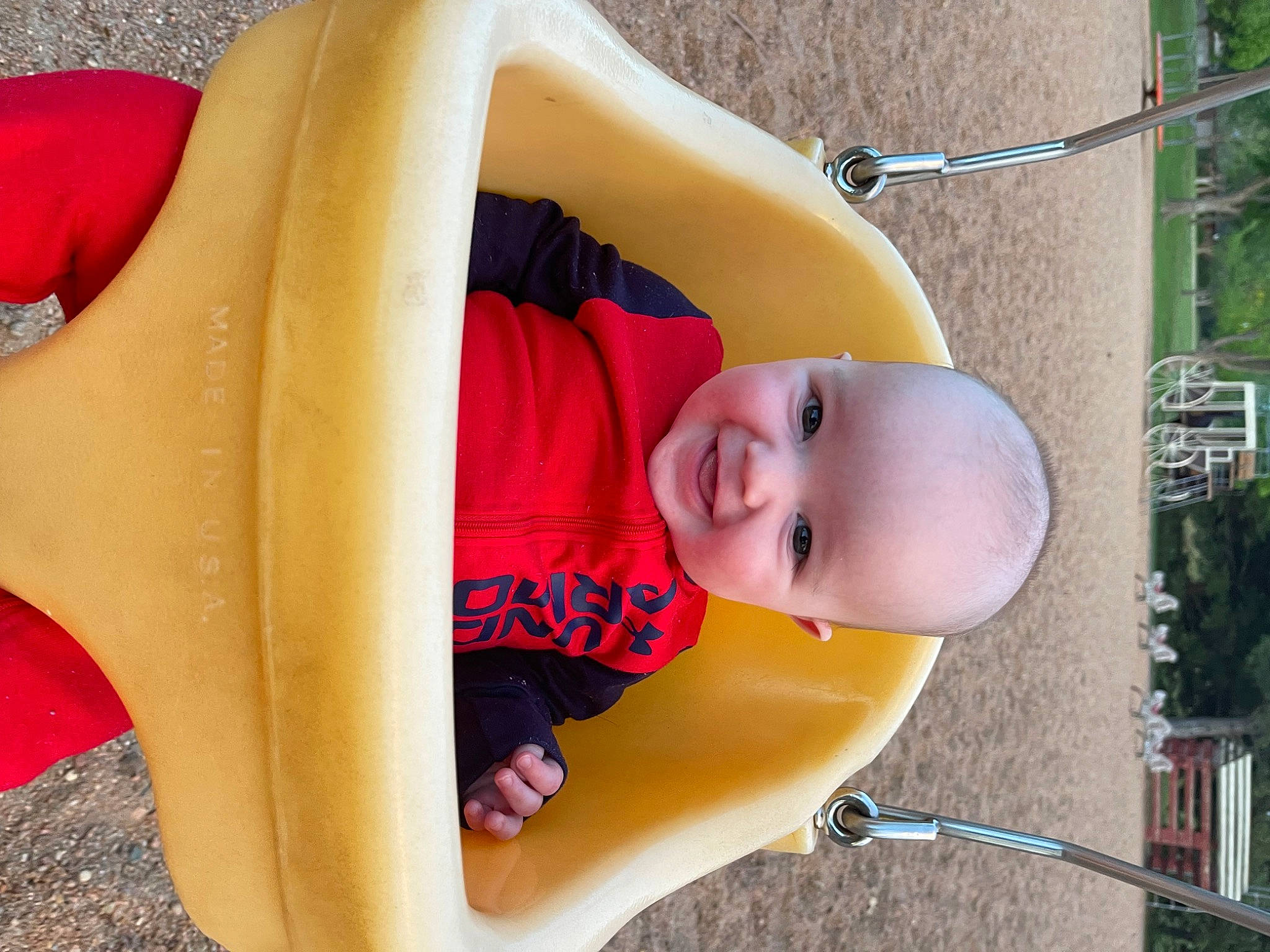 Cayson is registered to the contest to win money with this photo: art, baby, baby_toddler_clothing, child, chute, city, comfort, fun, grass, human_leg, joy, leisure, outdoor_play_equipment, person, plant, playground, public_space, recreation, smile, thigh