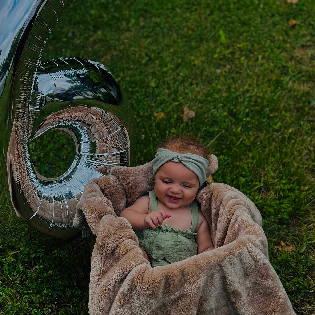 Alaia joined the competition — help win amazing prizes! alloywheel, baby, blanket, car, carwheel, clothing, face, grass, head, lawn, machine, person, photography, plant, portrait, spoke, tire, transportation, vehicle, wheel