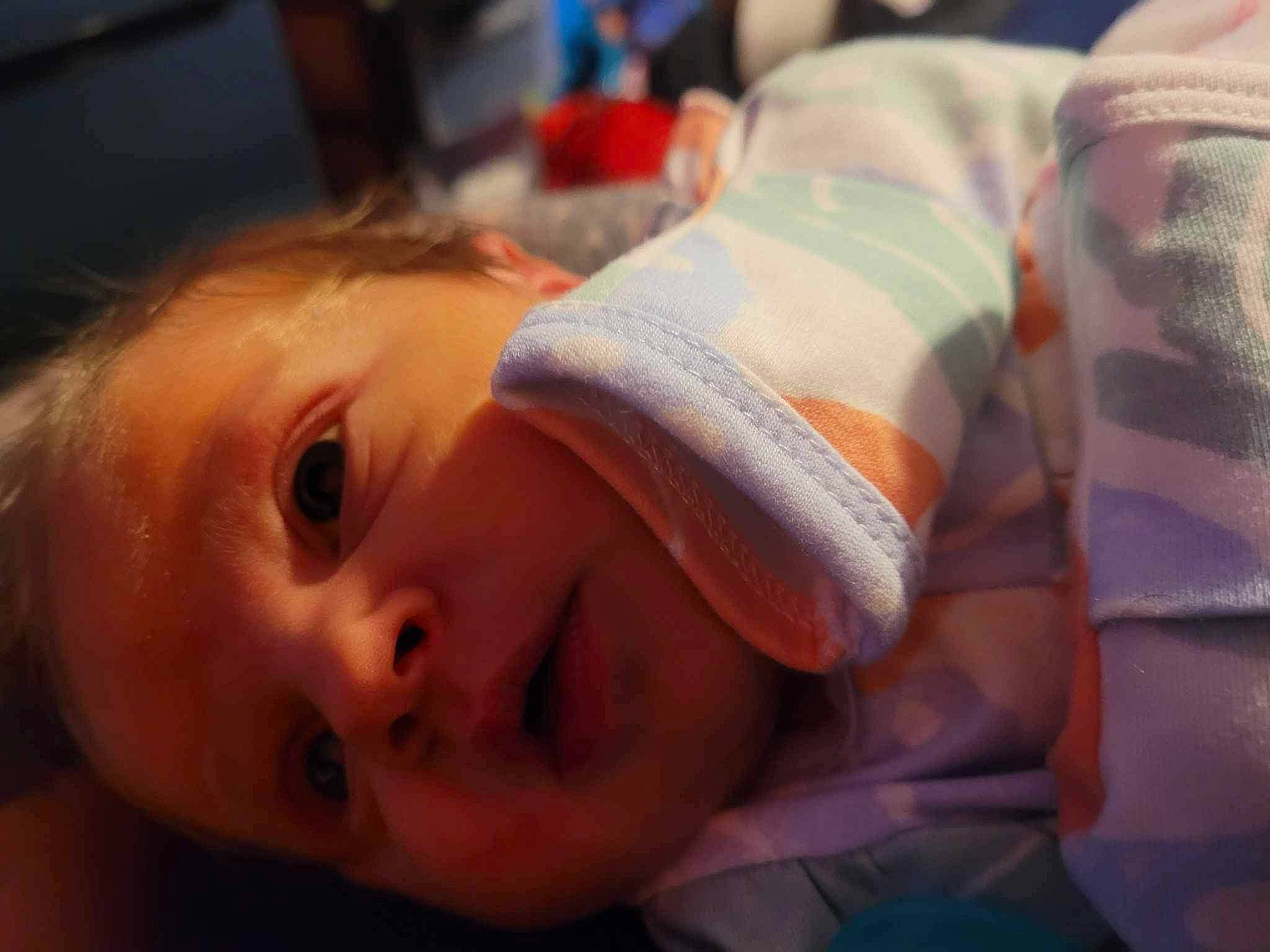 Ember joined the competition — help win amazing prizes! baby, baby_toddler_clothing, cheek, child, close_up, comfort, eyelash, flash_photography, fun, grass, happy, hat, lip, mouth, nose, person, portrait_photography, room, skin, smile