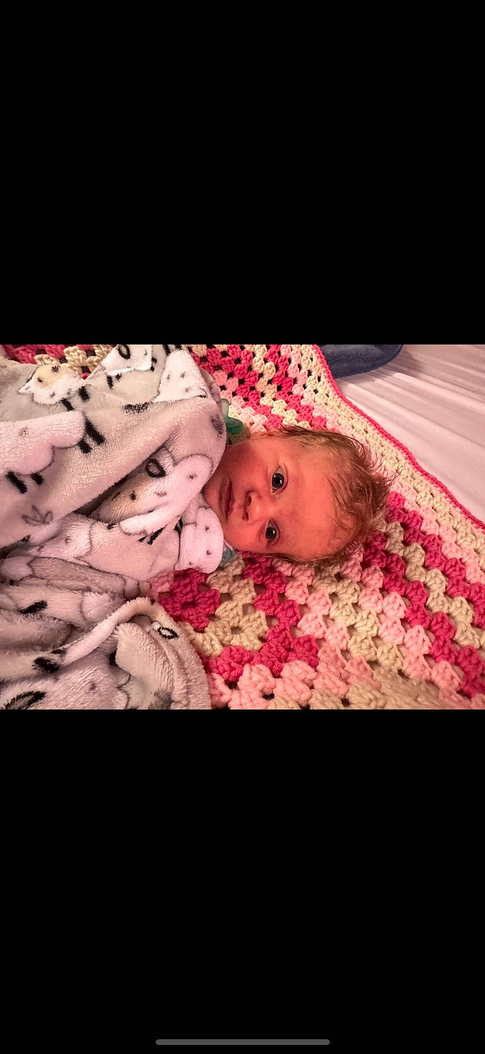 Ember is registered to the contest to win money with this photo: baby, baby_products, baby_safety, baby_toddler_clothing, bedtime, cheek, child, comfort, event, flash_photography, flesh, happy, linens, magenta, pattern, person, pink, skin, sleeve, textile