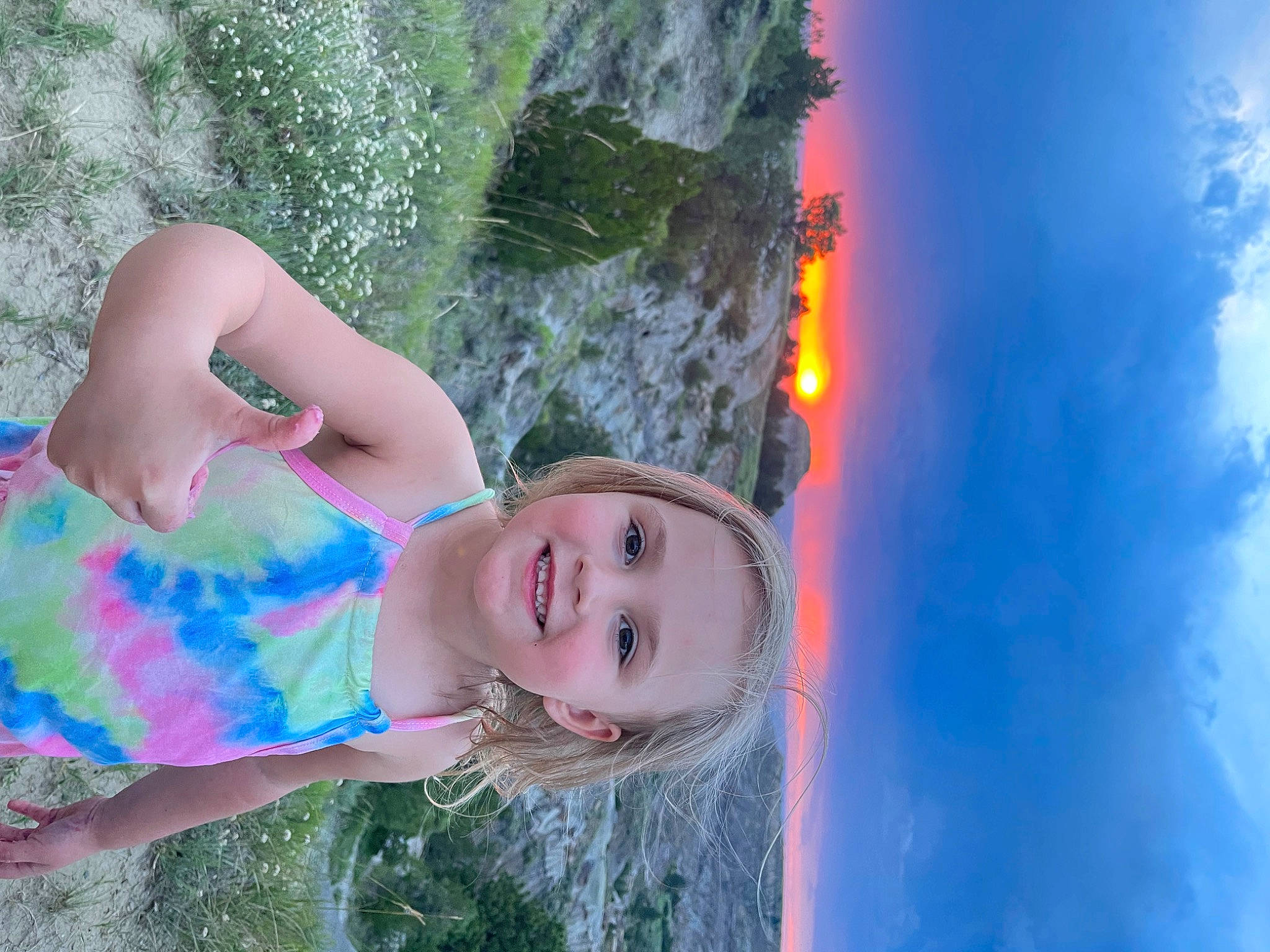 Adilyn is registered to the contest to win money with this photo: azure, beauty, body_of_water, child, cloud, electric_blue, flash_photography, fun, grass, happy, joy, leisure, people_in_nature, person, plant, sky, smile, summer, sunlight, tree