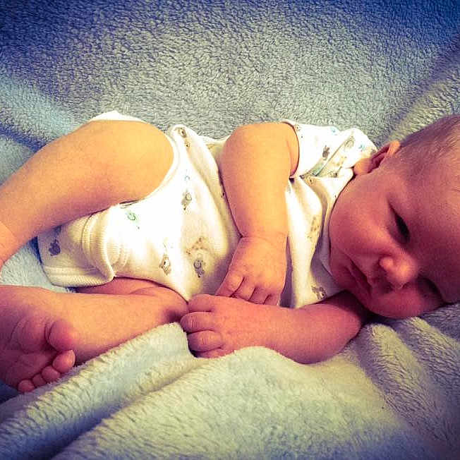 Joshua is registered to the contest to win money with this photo: bedtime, cheek, child, ear, finger, girl, hand, infant, lip, mouth, nap, nose, person, skin, sleep, toddler