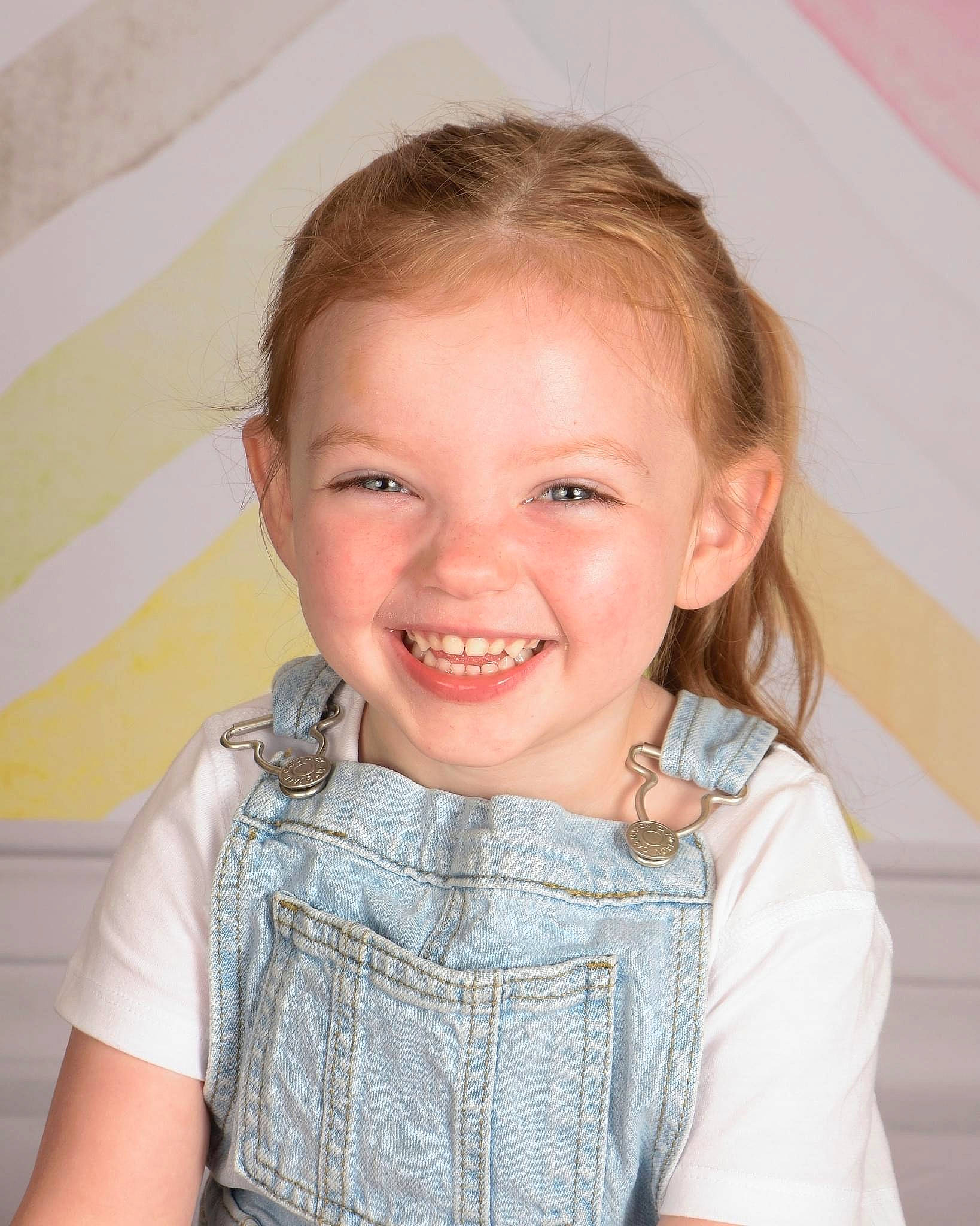 Peyton is registered to the contest to win money with this photo: arm, cheek, chin, eye, eyebrow, eyelash, face, forehead, head, human_body, iris, joint, joy, lip, mouth, neck, nose, person, shoulder, skin