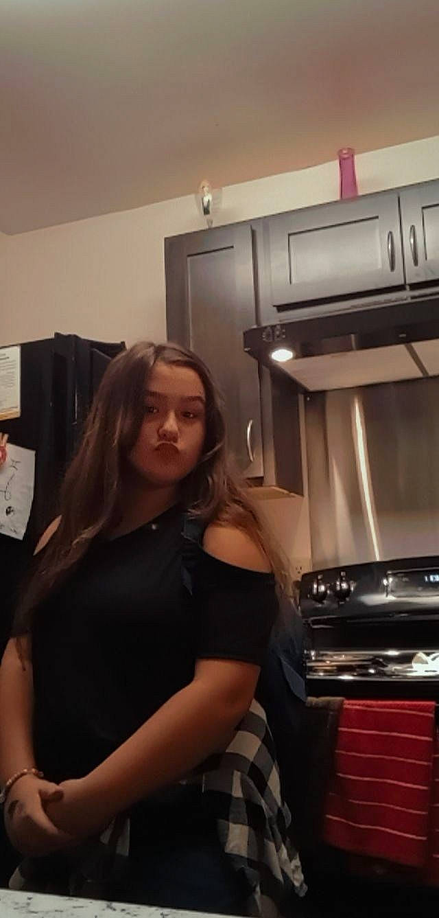 Megan is registered to the contest to win money with this photo: cabinetry, cooking, cooktop, cookware_and_bakeware, cuisine, flash_photography, flooring, gas, gas_stove, home_appliance, homemaker, kitchen, kitchen_appliance, kitchen_stove, major_appliance, microwave_oven, person, small_appliance, stove, thigh