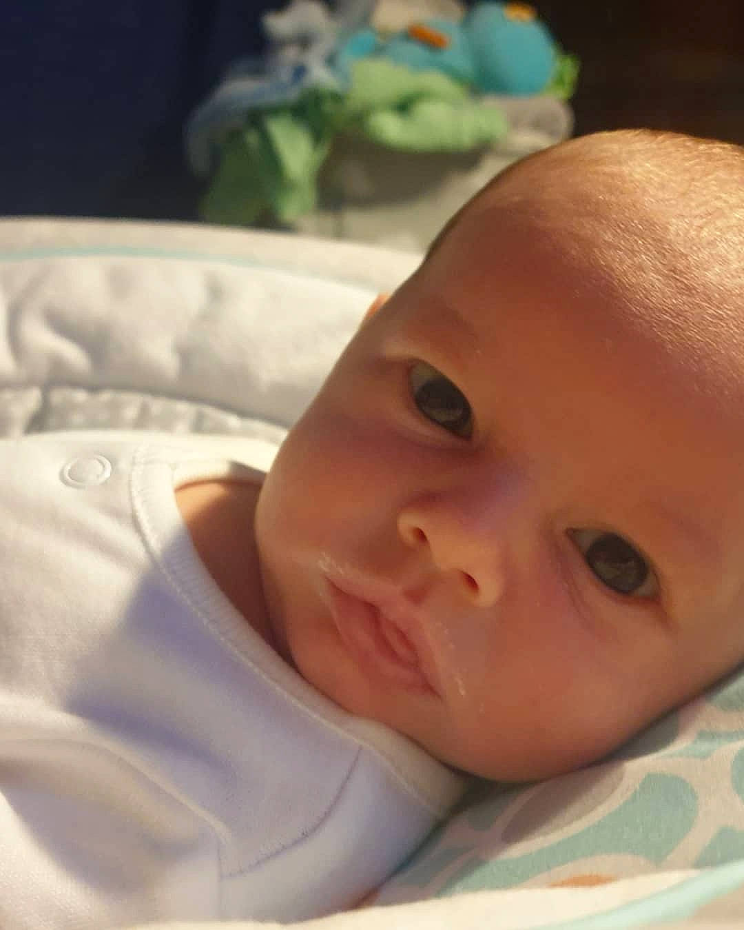 Kelly joined the competition — help win amazing prizes! baby, baby_toddler_clothing, bedtime, cheek, child, comfort, ear, eye, eyebrow, eyelash, forehead, grass, houseplant, iris, linens, lip, nose, person, skin, thumb