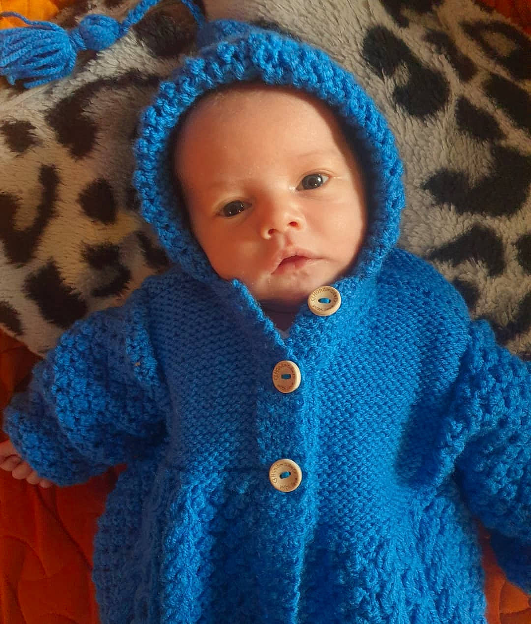 Kelly joined the competition — help win amazing prizes! aqua, azure, baby, baby_toddler_clothing, blue, cap, cheek, cool, electric_blue, eye, headgear, iris, knit_cap, organ, outerwear, person, product, skin, sleeve, toddler