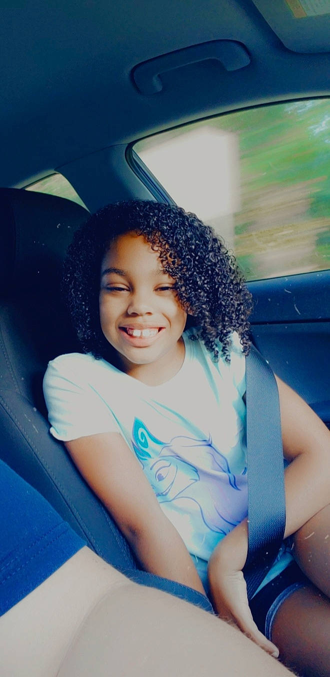 Sabrina joined the competition — help win amazing prizes! afro, automotive_design, automotive_exterior, black_hair, blue, car, car_seat, cool, electric_blue, flash_photography, fun, hairstyle, happy, joy, leisure, long_hair, motor_vehicle, person, smile, tints_and_shades