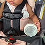 Cherish joined the competition — help win amazing prizes! baby, car_seat, bottle, child, infant, seatbelt, pink_clothing, lace, cushion, floral_pattern, safety_strap, closeup, indoor, person, cute, small_hand, footwear, white_socks, resting, young_child
