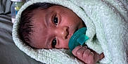 Grayson joined the competition — help win amazing prizes! baby, blanket, pacifier, hand, face, eyes, bottle, bed, soft, wrapped, newborn, infant, sleepy, cute, cozy, resting, nursery, skin, closeup, portrait