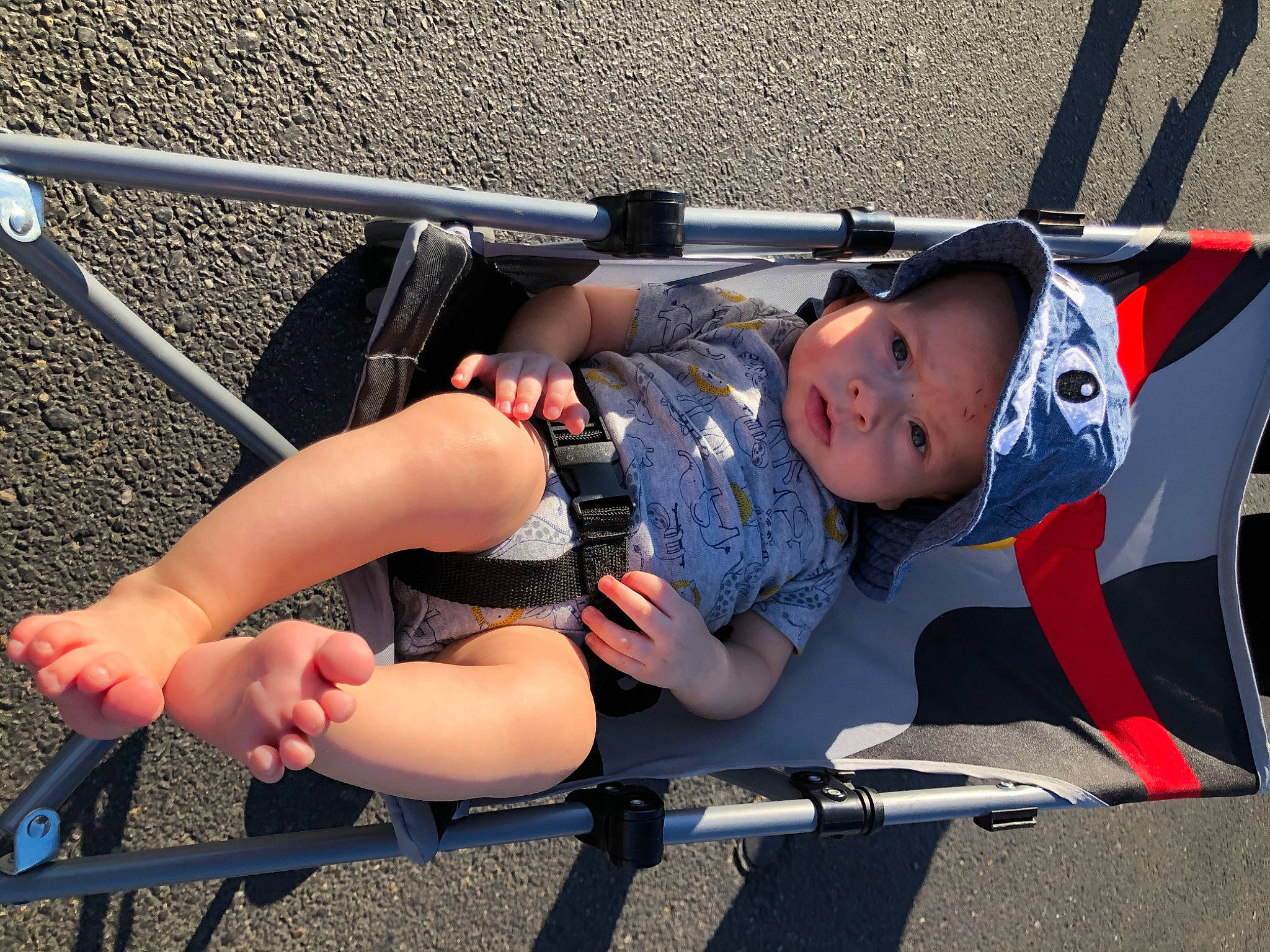 Ermias is registered to the contest to win money with this photo: baby_carriage, baby_products, child, headwear, leg, leisure, person, playground, product, recreation, vacation, vehicle