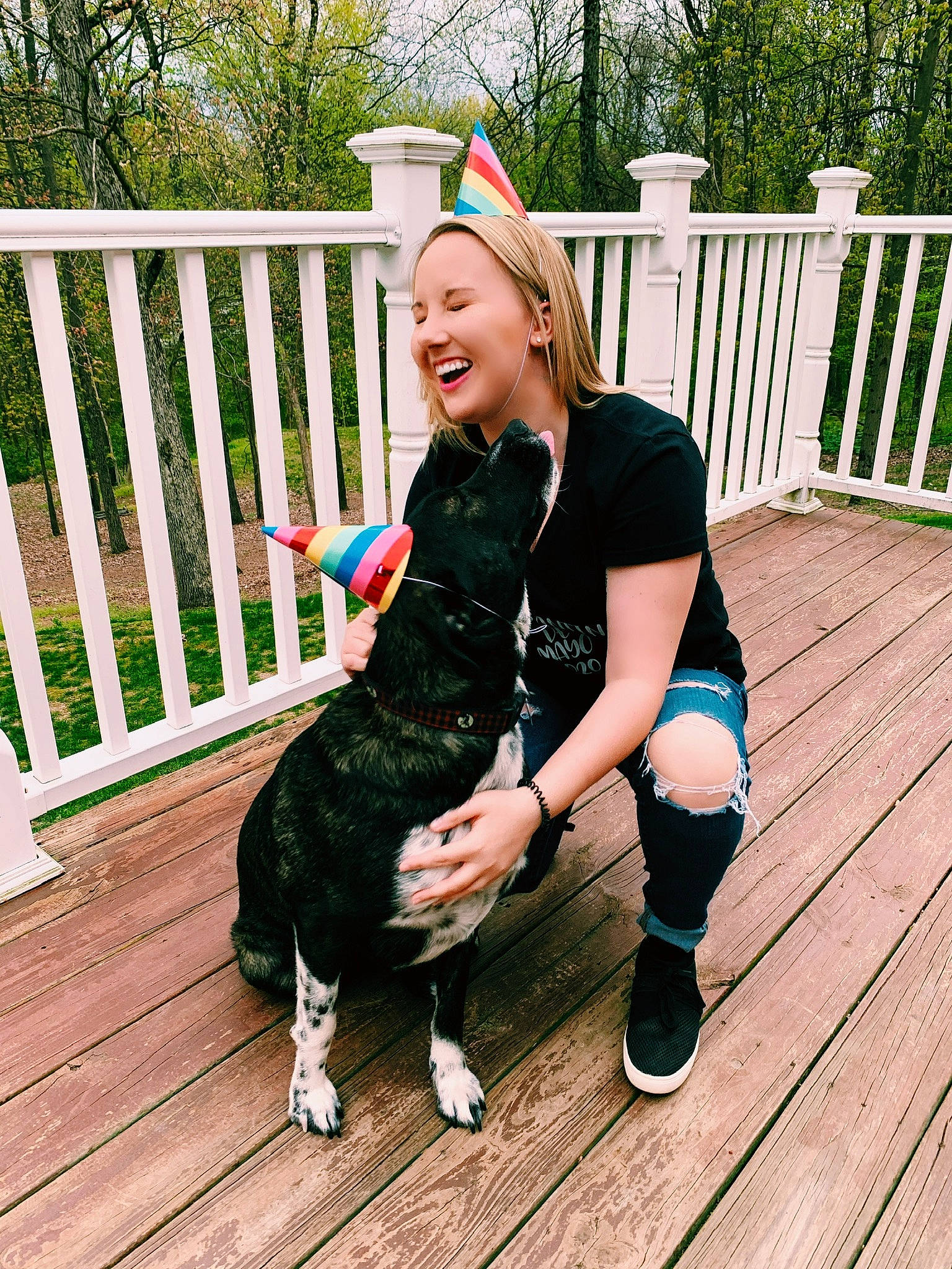 Remi is registered to the contest to win money with this photo: carnivore, companion_dog, dog, dog_breed, eye, face, fawn, fence, grass, hair, happy, knee, leg, leisure, plant, shoe, smile, thigh, tree, wood